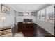 Home office with wood desk, and built-in shelving at 174 Country Lake Dr, Mooresville, NC 28115