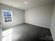 Well lit bedroom with carpet flooring and a window at 174 Swann Rd, Statesville, NC 28265