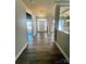 Spacious entryway with hardwood floors and views into living room and dining room at 174 Swann Rd, Statesville, NC 28265