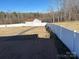 Large backyard with white vinyl fence and storage shed at 1915 Pleasant Hill Church Rd, Shelby, NC 28152