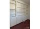 Built-in white shelves and cabinets at 1915 Pleasant Hill Church Rd, Shelby, NC 28152