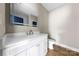 Clean bathroom with white vanity, granite counters, and illuminated mirror at 211 Benfield Rd, Kings Mountain, NC 28086