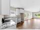 Open kitchen and living room featuring granite countertops and stainless steel appliances at 211 Benfield Rd, Kings Mountain, NC 28086