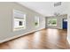 Bright living room with hardwood floors, bright windows and a ceiling fan at 211 Benfield Rd, Kings Mountain, NC 28086