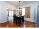 Breakfast nook area featuring hardwood floors and view to outdoor living space at 21222 W Tern Ct, Fort Mill, SC 29707