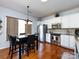 Cozy kitchen featuring stainless steel appliances, white cabinetry, and a breakfast nook at 21222 W Tern Ct, Fort Mill, SC 29707