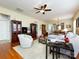 Bright and open living room with hardwood floors, a ceiling fan, and comfortable seating at 21222 W Tern Ct, Fort Mill, SC 29707