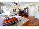 Inviting living room with hardwood floors, a ceiling fan, and a view into the foyer at 21222 W Tern Ct, Fort Mill, SC 29707