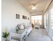 Bright sunroom with white wicker furniture and lots of natural light at 21222 W Tern Ct, Fort Mill, SC 29707