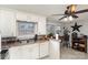 White kitchen with double sink, stainless steel appliances, and breakfast bar at 225 Spencer St, Rock Hill, SC 29730