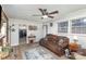 Living room with brown couch and view into kitchen area at 225 Spencer St, Rock Hill, SC 29730