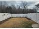 Small backyard with white fence at 240 Harrison Ln, Locust, NC 28097