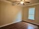 Bright bedroom with hardwood floors and window at 240 Harrison Ln, Locust, NC 28097