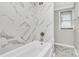 Spacious bathroom featuring a tile shower with glass door, tile floor and vanity at 2520 Lower Stone Church Rd, Rockwell, NC 28138