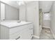 Bright bathroom featuring marble floors, vanity, and shower/bath combo at 2520 Lower Stone Church Rd, Rockwell, NC 28138