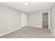 Neutral bedroom with carpeted floor and closet at 2520 Lower Stone Church Rd, Rockwell, NC 28138