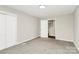 Neutral bedroom with carpeted floor and closet at 2520 Lower Stone Church Rd, Rockwell, NC 28138