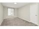 Neutral bedroom features one window, carpet, and closet at 2520 Lower Stone Church Rd, Rockwell, NC 28138