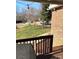 View from deck showcases a fenced backyard and neighborhood at 2521 Whistler Ct, Newton, NC 28658