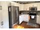 Kitchen with stainless steel appliances and white cabinets at 2521 Whistler Ct, Newton, NC 28658