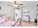 Bedroom with view into another room, ceiling fan, and wood floors at 2961 Great Falls Hwy, Lancaster, SC 29720