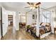 Bright bedroom with mirrored closet doors and wood floors at 2961 Great Falls Hwy, Lancaster, SC 29720