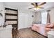 Bedroom with a double closet, wood floors, and built-in shelves at 2961 Great Falls Hwy, Lancaster, SC 29720