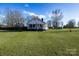 Simple white house with a spacious green lawn at 2961 Great Falls Hwy, Lancaster, SC 29720