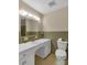 Clean bathroom with olive green tile and a large vanity at 3003 River Rd, Shelby, NC 28152