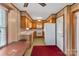 Kitchen features wood cabinets, white appliances, and a microwave at 3003 River Rd, Shelby, NC 28152