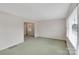 Spacious living room with neutral walls and carpet at 3003 River Rd, Shelby, NC 28152