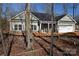 New construction home with gray siding, stone accents and a two-car garage at 3015 Buffet Ln, Monroe, NC 28110