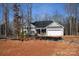 New construction home with gray siding and a two-car garage at 3015 Buffet Ln, Monroe, NC 28110