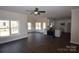 Open concept kitchen with white cabinets and quartz countertops at 3015 Buffet Ln, Monroe, NC 28110