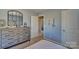 Spacious bedroom with dresser and access to another room at 3048 Ora Smith Rd, Lincolnton, NC 28092