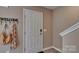 Front entry with coat hooks and a view of the staircase at 3048 Ora Smith Rd, Lincolnton, NC 28092