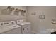 Laundry room with washer, dryer, and shelving at 3048 Ora Smith Rd, Lincolnton, NC 28092