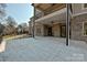 Expansive back patio with brick accents, ideal for outdoor entertaining and relaxing with Gathering and friends at 3319 Gresham Pl, Charlotte, NC 28211