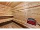 Sauna featuring wood-paneled walls and benches and sauna heater at 3319 Gresham Pl, Charlotte, NC 28211