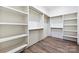 Spacious walk-in closet with custom shelving and ample storage space at 3319 Gresham Pl, Charlotte, NC 28211