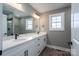 Elegant bathroom with a double vanity and quartz countertop at 343 North Brook Iii School Rd, Vale, NC 28168