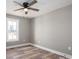 Spacious bedroom with ceiling fan and vinyl plank flooring at 343 North Brook Iii School Rd, Vale, NC 28168