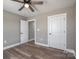 Spacious bedroom with ceiling fan and vinyl plank flooring at 343 North Brook Iii School Rd, Vale, NC 28168