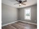 Bright bedroom with ceiling fan and vinyl plank flooring at 343 North Brook Iii School Rd, Vale, NC 28168