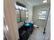 Modern bathroom with blue glass sink, frameless shower, and stylish vanity at 4165 Laurelwood Ct, Concord, NC 28025