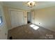 Bright bedroom with neutral carpeting and an ensuite bathroom at 4165 Laurelwood Ct, Concord, NC 28025