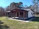 Ranch home with new covered porch and landscaping at 4165 Laurelwood Ct, Concord, NC 28025