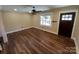 Living room features hardwood floors and neutral walls at 4165 Laurelwood Ct, Concord, NC 28025