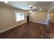 Bright living room with hardwood floors and large window at 4165 Laurelwood Ct, Concord, NC 28025