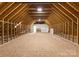 Unfinished attic space with wood framing and flooring at 498 New Salem Rd, Statesville, NC 28625